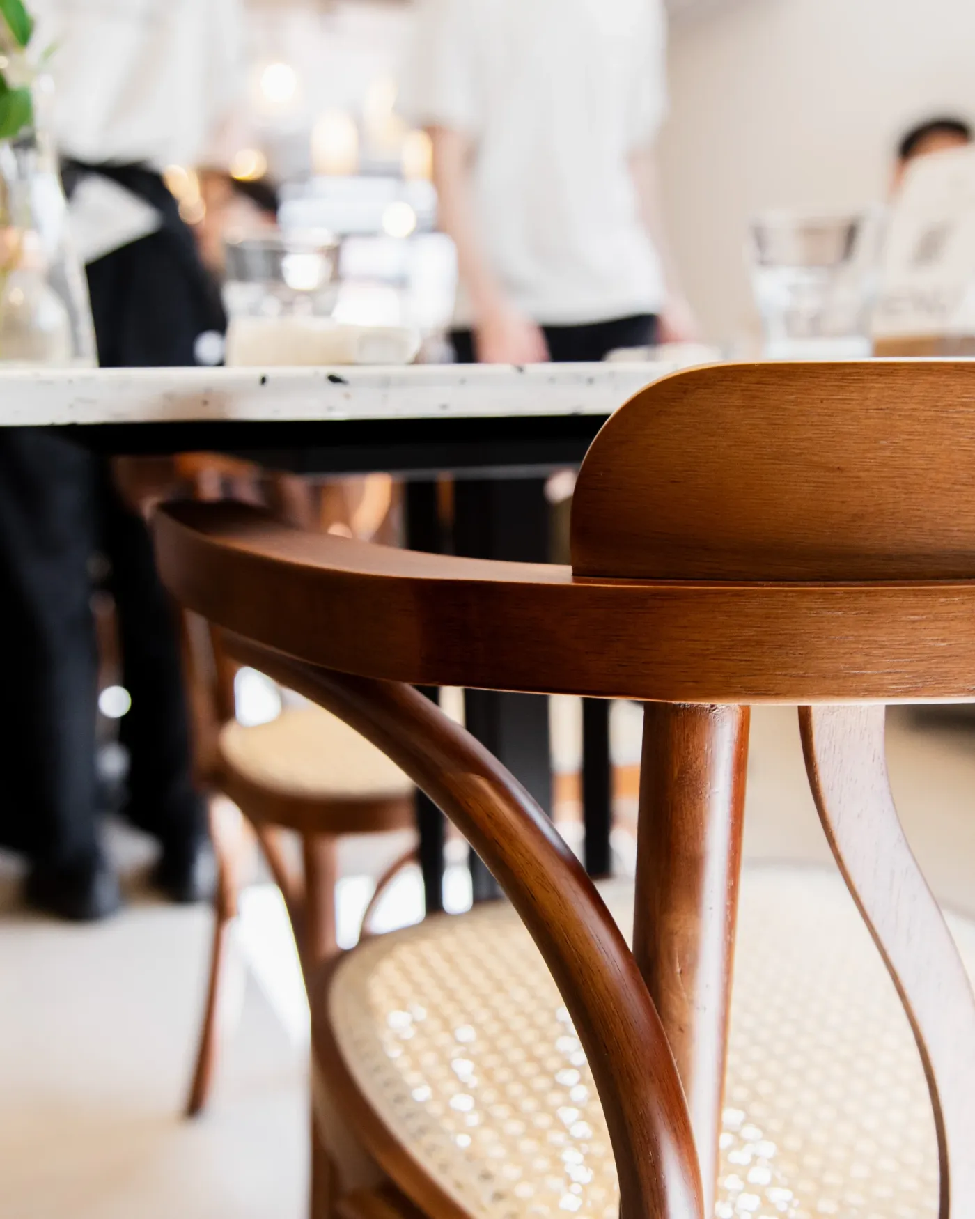 Bentwood chair detail with the Eggstatic Montreal team prepping in the background
